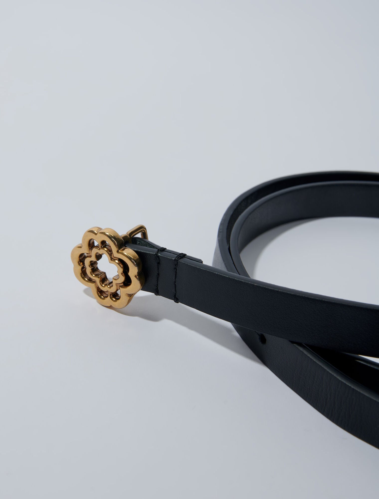 Black  -Narrow black leather belt gold buckle