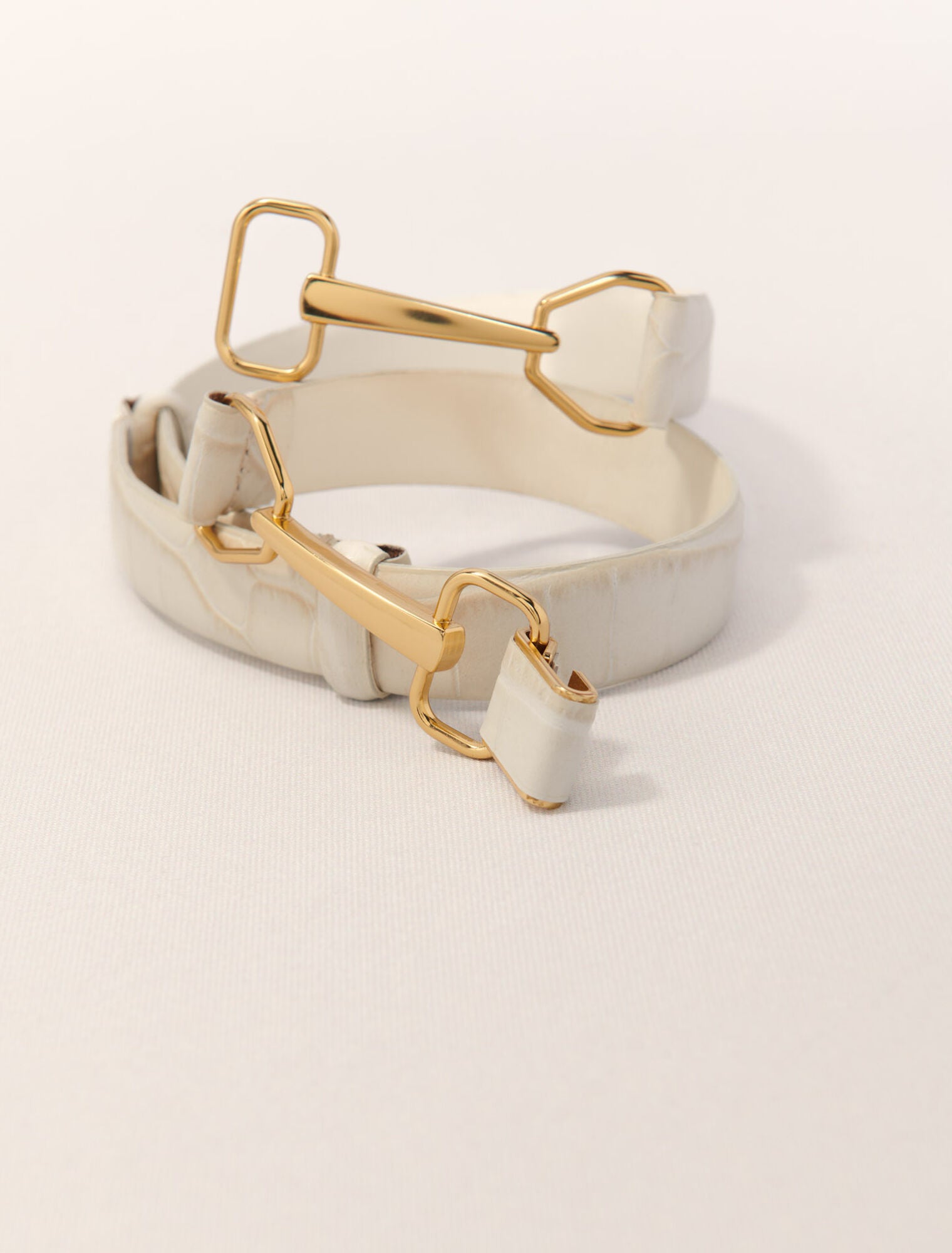 Ecru-Leather belt with horse bit buckle