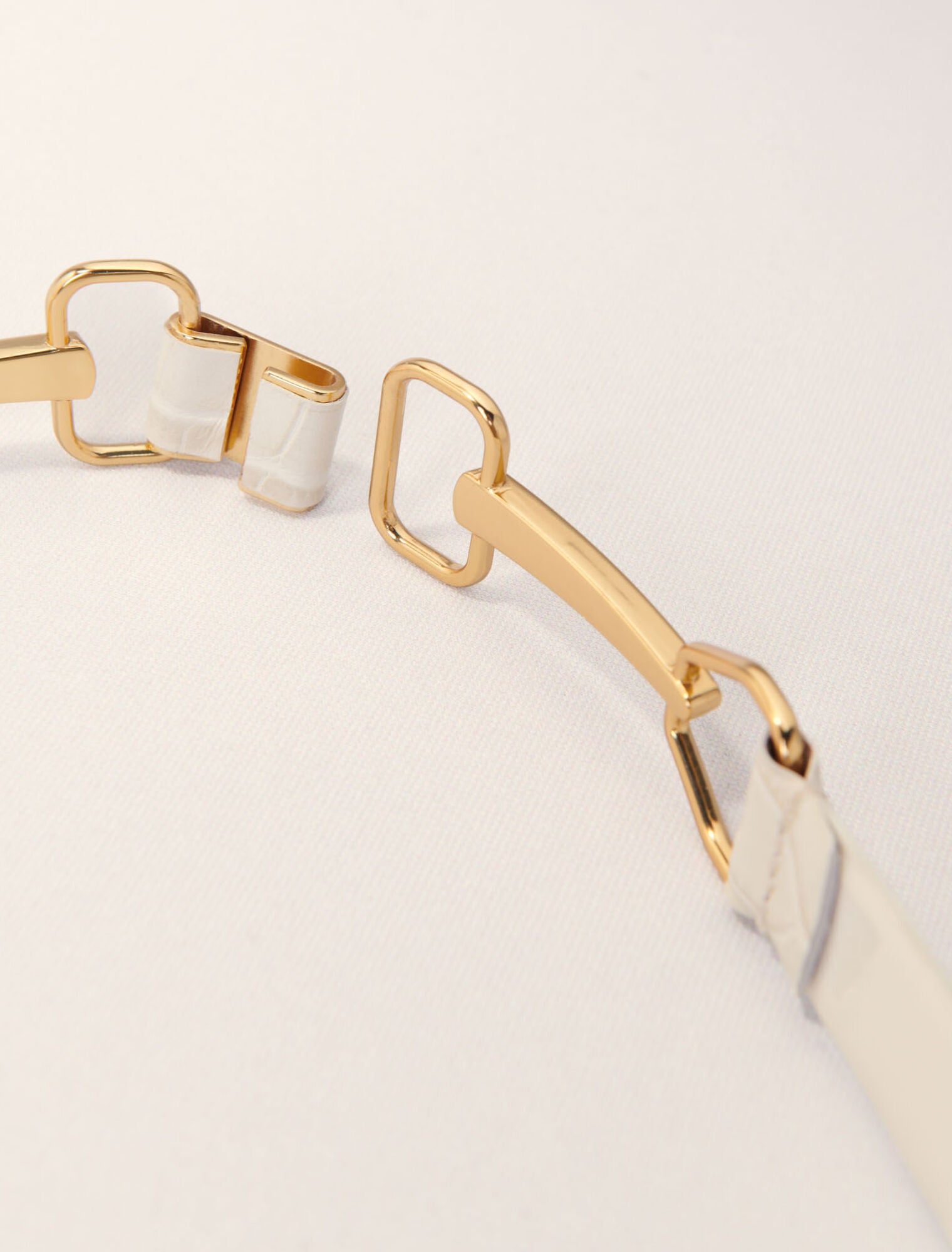 Ecru-Leather belt with horse bit buckle