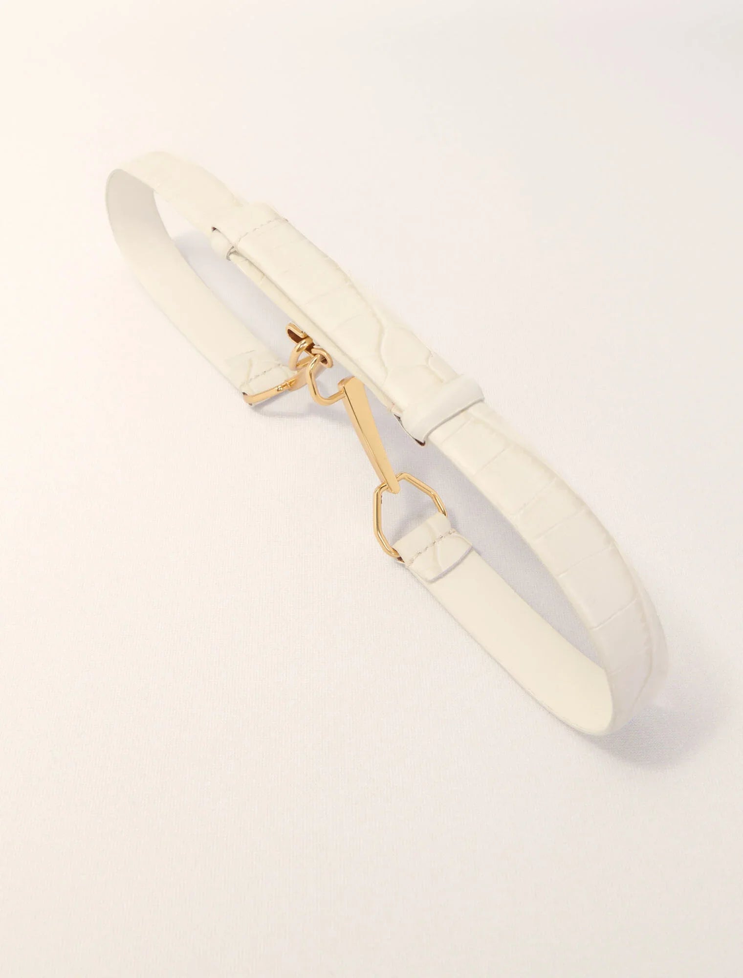 Ecru-Leather belt with horse bit buckle