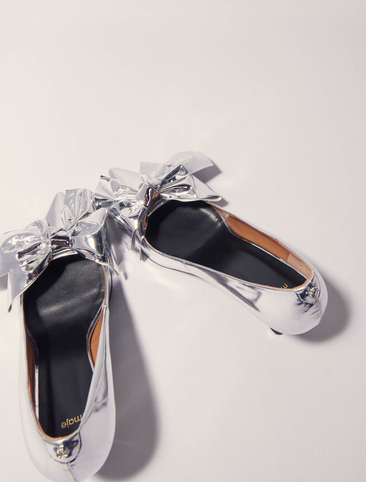 Silver Leather pumps with bow detail