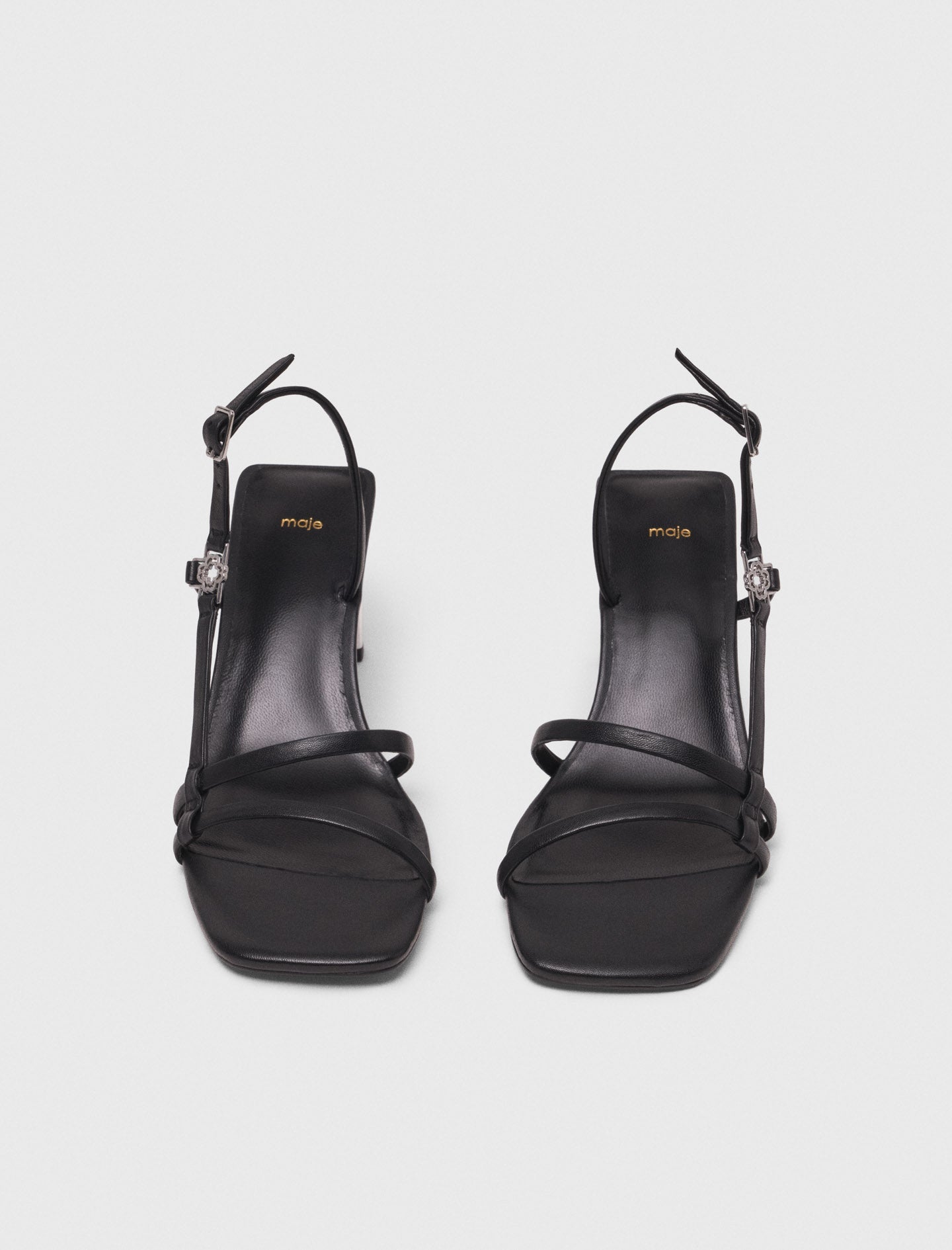 Strappy sandals with metallic heel