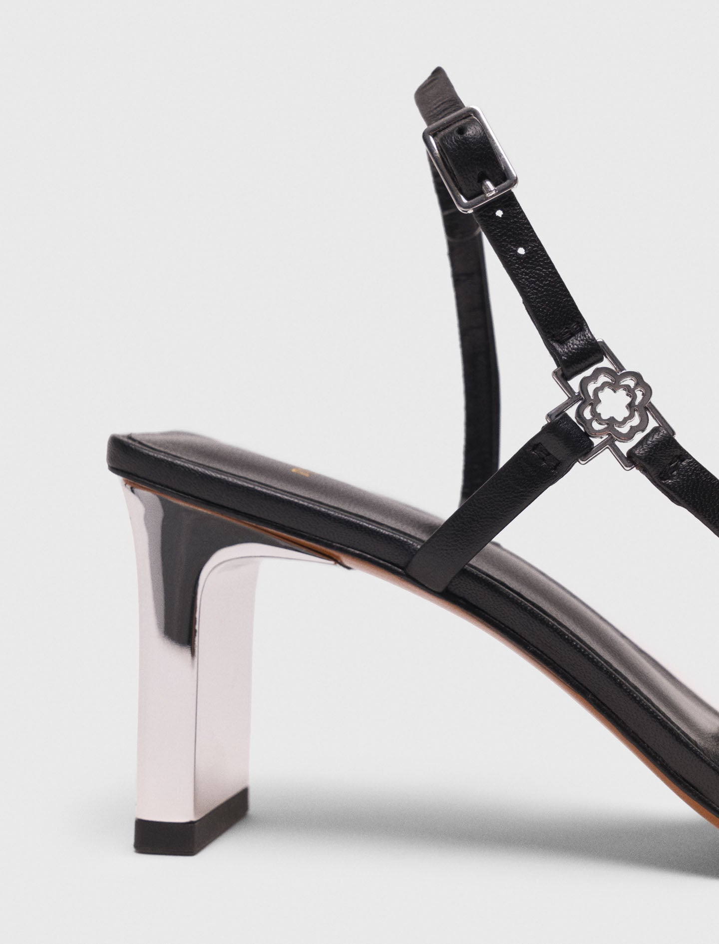 Strappy sandals with metallic heel