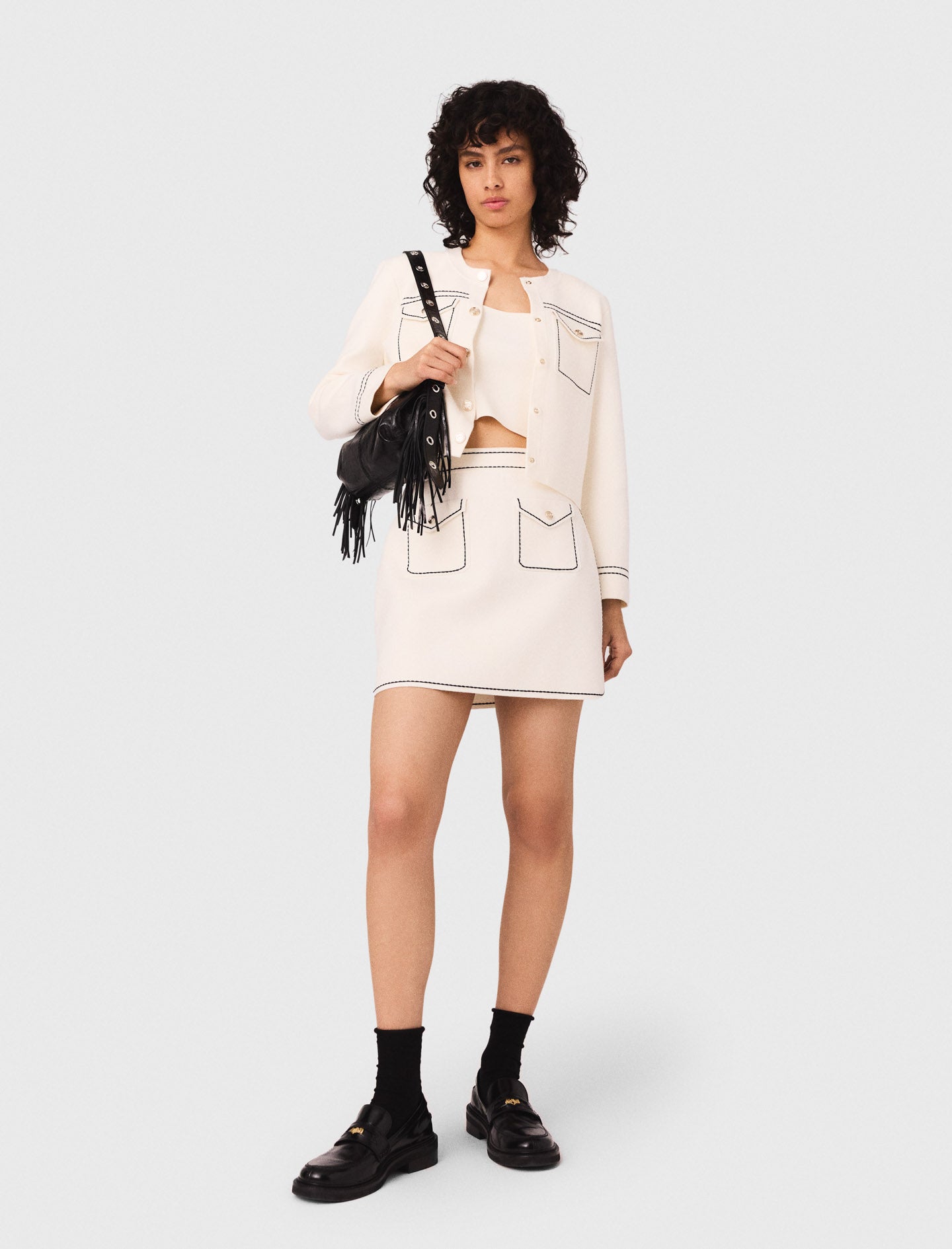 Short topstitched knit skirt