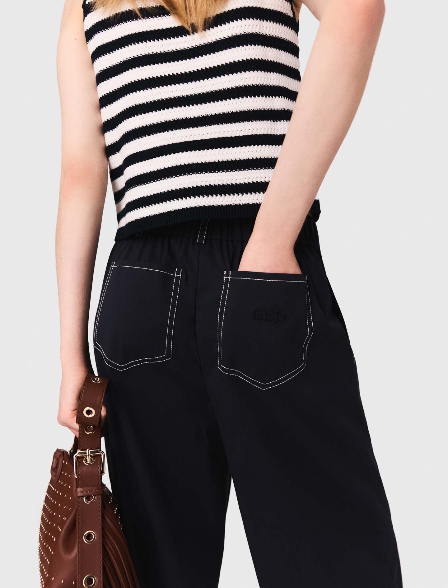 Cotton trousers with leather belt
