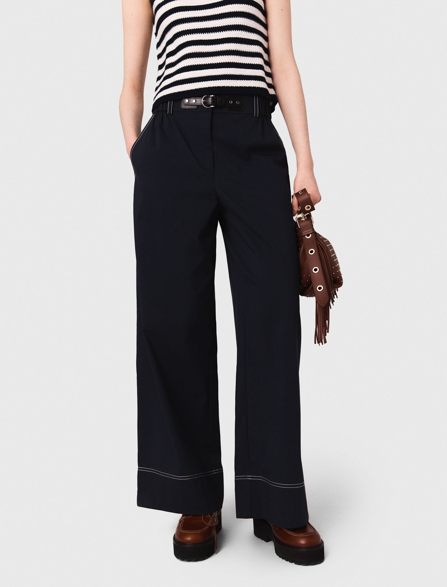 Cotton trousers with leather belt