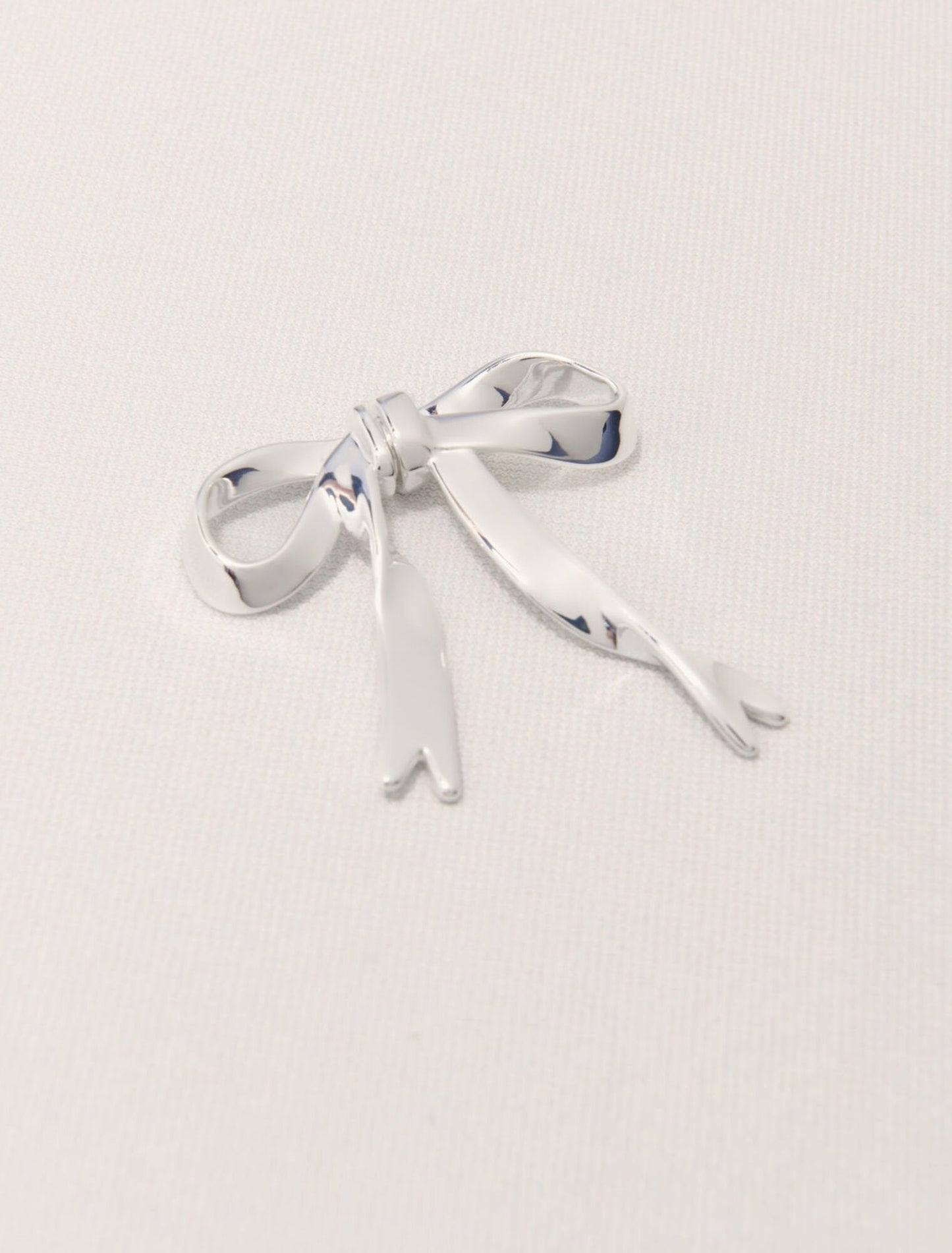 Silver-Silver bow earring