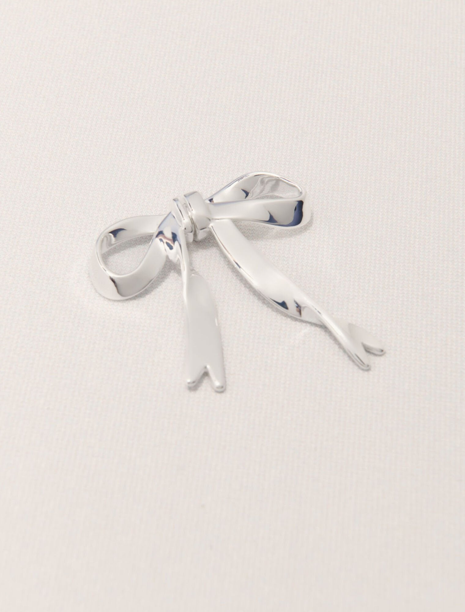 Silver-Silver bow earring