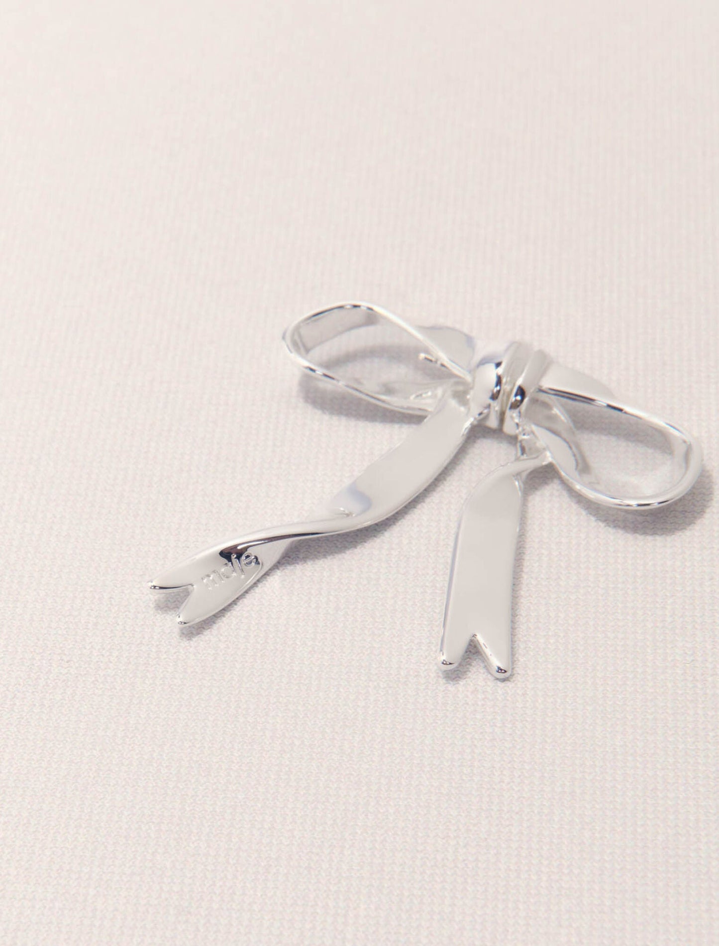 Silver-Silver bow earring