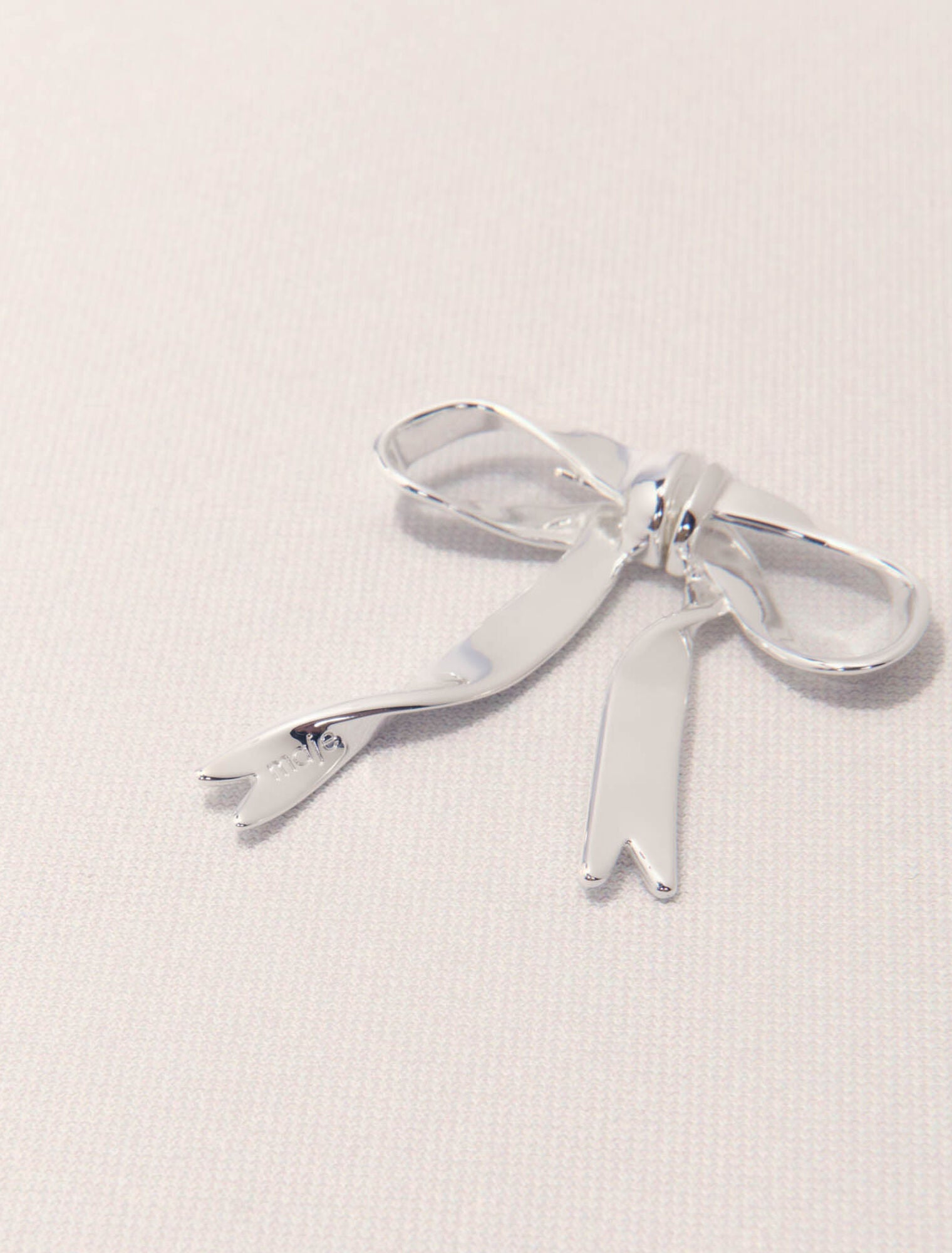 Silver-Silver bow earring