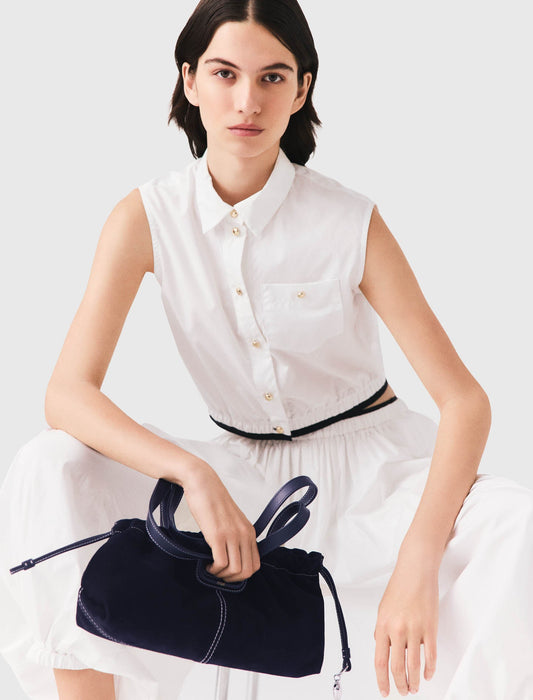 Cropped sleeveless shirt White