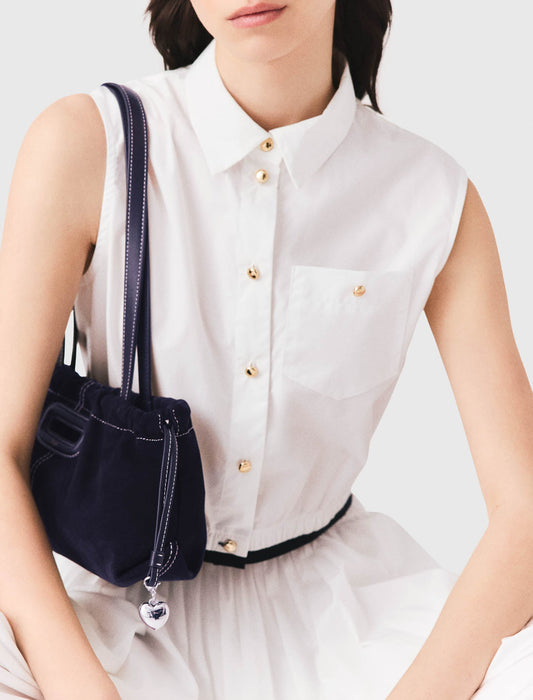 Cropped sleeveless shirt White