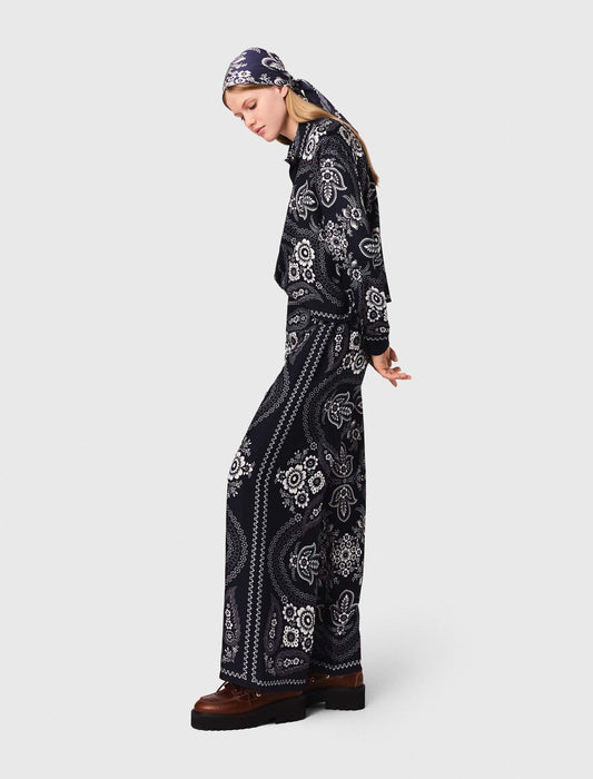 Flowing paisley print trousers