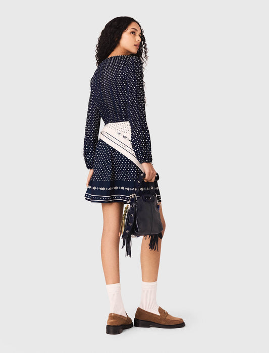 فستان منقط بثنيات